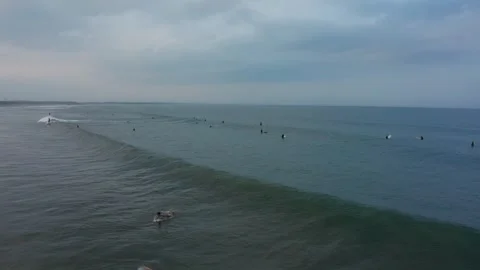Drone flight over surfers in Aoshima Miyazaki Japan Video stock 259363473