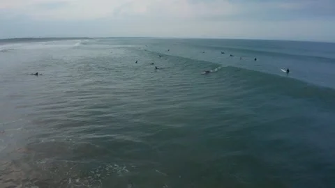 Drone flight over surfers in Aoshima Miyazaki Japan Stock Footage 259363534