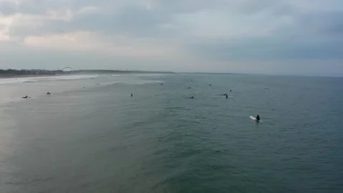 Drone flight over surfers in Aoshima Miyazaki Japan Stock Footage 259363898