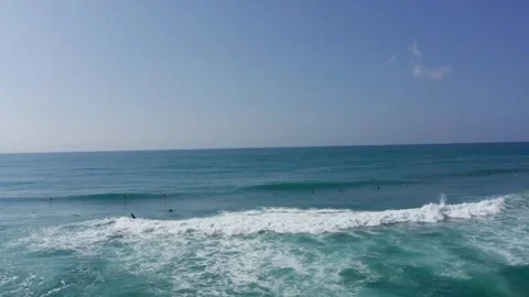 Drone flight over surfers in Aoshima Miyazaki Japan Stock Footage 259366087