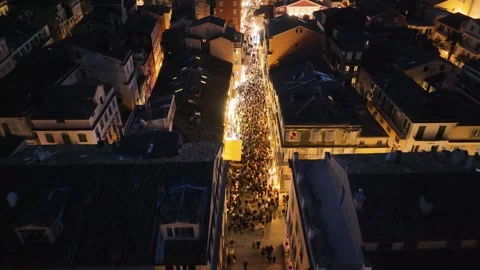 Drone flight over thousands of people crowding the historic alleyways of Corfu Stock Footage 333917563