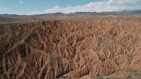 Drone flight over the Tigris Mountains, overlooking a hilly sandy valley, 4K. Stock Footage 111368972