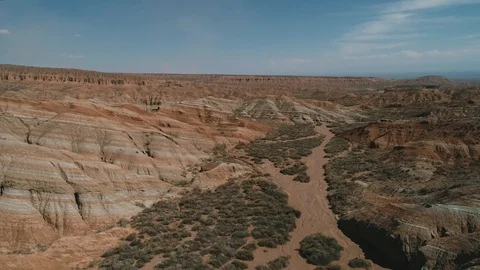 Drone flight over the Tigris Mountains, overlooking a hilly sandy valley, 4K. Stock Footage 111369006