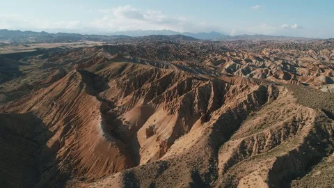 Drone flight over the Tigris Mountains, overlooking a hilly valley, 4K Stock Footage 111370657