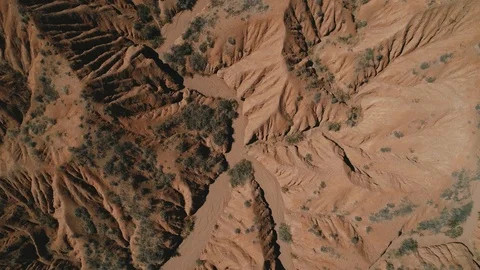 Drone flight over the Tigris Mountains, overlooking a hilly sandy valley, 4K Stock Footage 111371045