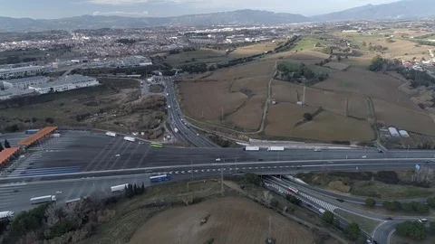 Drone flight over a toll with orange booths Stock Footage 85356609