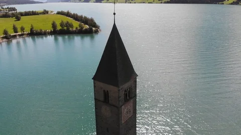 Drone Flight over the Tower of Reschenpass Stock Footage 115494521