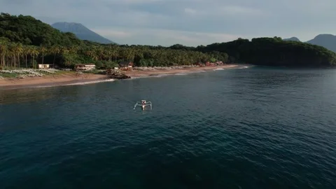 Drone Flight Over Traditional Boat Near Virgin Beach in Bali Видео 337802194
