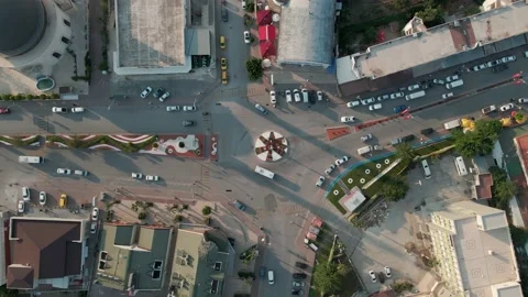 Drone flight over traffic in a small town by the sea, Turkey 4k Stock Footage 214882415