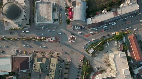 Drone flight over traffic in a small town by the sea, Turkey, Kemer 4k Stock Footage 214901820