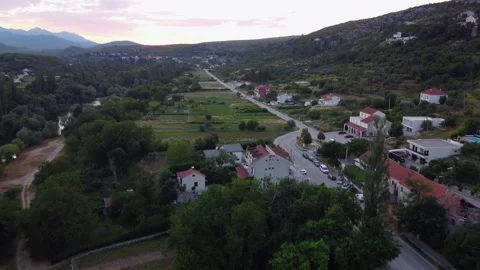 Drone Flight over Tree Revealing Blato na Cetini, Croatia at Sunset Stock Footage 314746859