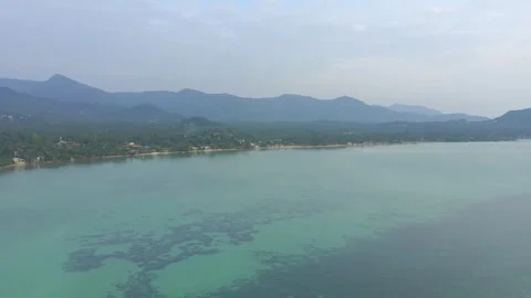 Drone flight over tropical island at sunset Koh Phangan Stock Footage 328964860