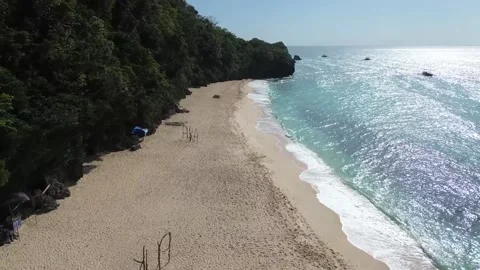 Drone flight over tropical Puka Beach coastline Boracay island clear blue oc Stock Footage 334050093