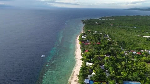 Drone flight over tropical White Beach in Moalboal Cebu Philippines 103 Stock Footage 334634838