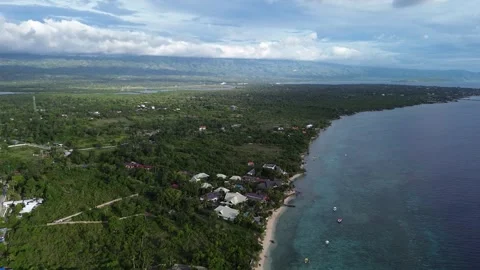 Drone flight over tropical White Beach in Moalboal Cebu Philippines 104 Stock Footage 334634874
