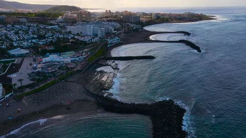 Drone flight over the Troya beach Tenerife, Playa de las Americas. Stock-Footage 228968151