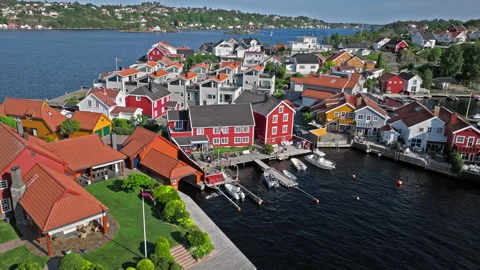 Drone flight over Tyholmen island harbour in Arendal. Stock Footage 328126587