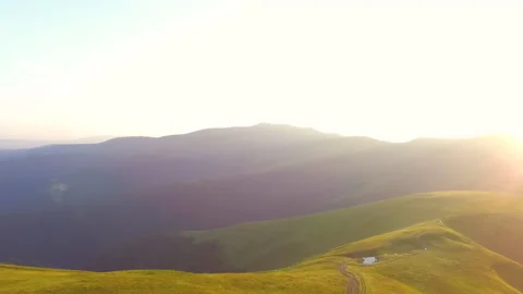 Drone flight over the Ukrainian Carpathians. Mountains on a summer sunny day Stockbeeldmateriaal 130280219