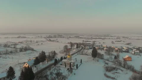 Drone flight over the Ukrainian snow-covered village. A winter fairy tale Stock Footage 149302575