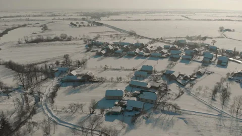 Drone flight over the Ukrainian snow-covered village. A winter fairy tale Stock Footage 149308002