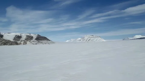 Drone Flight Over Vast Arctic Snow Landscape in Remote Svalbard Stock Footage 340037363