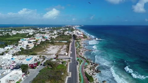 Drone flight over the vibrant blue waters of the Isla Mujeres, Mexico Stock Footage 331519649