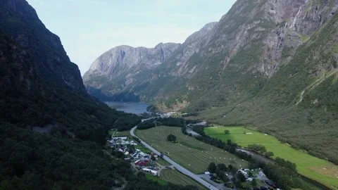 Drone flight over the Viking Valley in Norway with a fjord in the background Stock-Footage 301383762