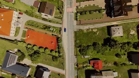 Drone flight over village rooftops in Poland, top-down view Stock Footage 317834029