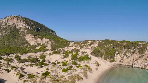 Drone flight over Voidokilia Beach dunes and coastline in Greece Stock Footage 335894978