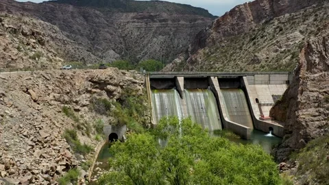 Drone flight over a water dam on Atuel canyon Stock Footage 255900481
