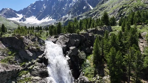 Drone flight over a waterfall and mountain lakes Stock Footage 345037509
