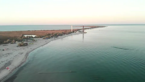 Drone flight over the white beach of Dzharylgach island on sunset. Stock Footage 145393447