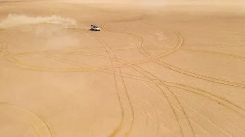Drone flight over white car dune drifting in desert Stock Footage 159003157