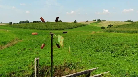 Drone flight over a wind pump Stock Footage 114383048
