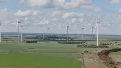 Drone Flight Over Wind Turbines in Open Fields 動画素材 334263284