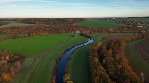 Drone Flight Over Winding River in Autumn Stock Footage 321291999