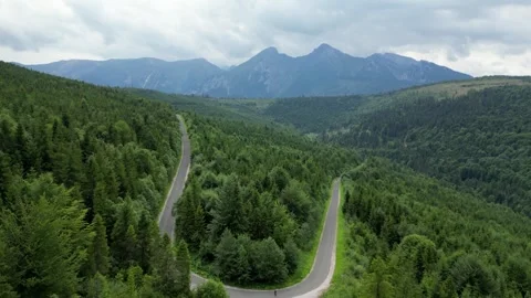 Drone flight over winding road in Osturňa–Ždiar Stock Footage 314766874