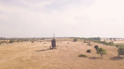 Drone flight over a windmill 動画素材 94444007