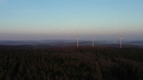 Drone flight over windmills in Lower Saxony landscape, Germany Stock Footage 134402989