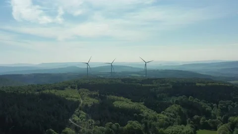 Drone flight over windmills in Lower Saxony landscape, Germany Видео 134405534