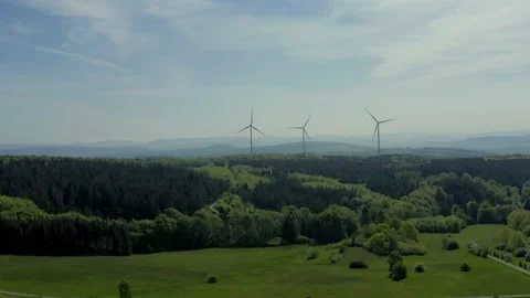 Drone flight over windmills in Lower Saxony landscape, Germany Stock Footage 134406138