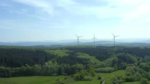 Drone flight over windmills in Lower Saxony landscape, Germany Stockbeeldmateriaal 134406175
