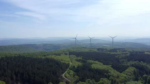 Drone flight over windmills in Lower Saxony landscape, Germany Stockbeeldmateriaal 134406231