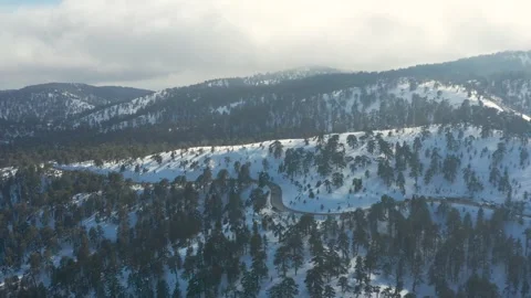 Drone flight over the winter mountains Stock Footage 247978564