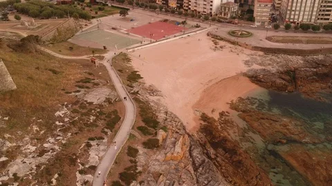 Drone flight panning over a walk path in Baiona, Galicia Stock Footage 123216881
