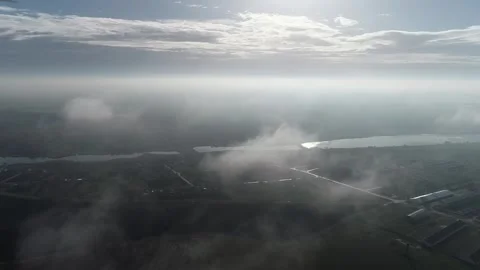Drone flight: panoramic hills, trees and river landscape in the rays of the sun Stock Footage 311129429