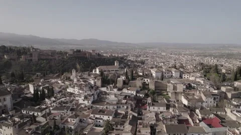 Drone flight pans over Granada City in Spain Stock Footage 196032362
