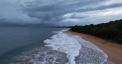 Drone flight parallel to shoreline over waves tropical beach Panama Vídeo Stock 332611196