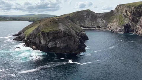 Drone flight past the Eire 63 coastal cliff, Ireland. Stock Footage 342665330