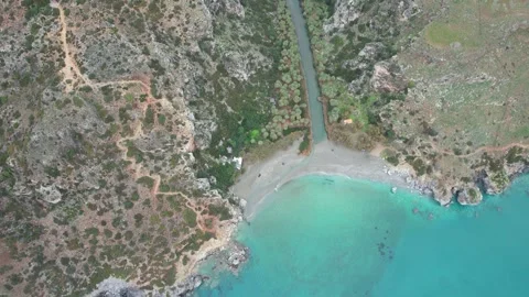 Drone flight from Preveli beach into the gorge and mountains, Crete Stock Footage 346723788